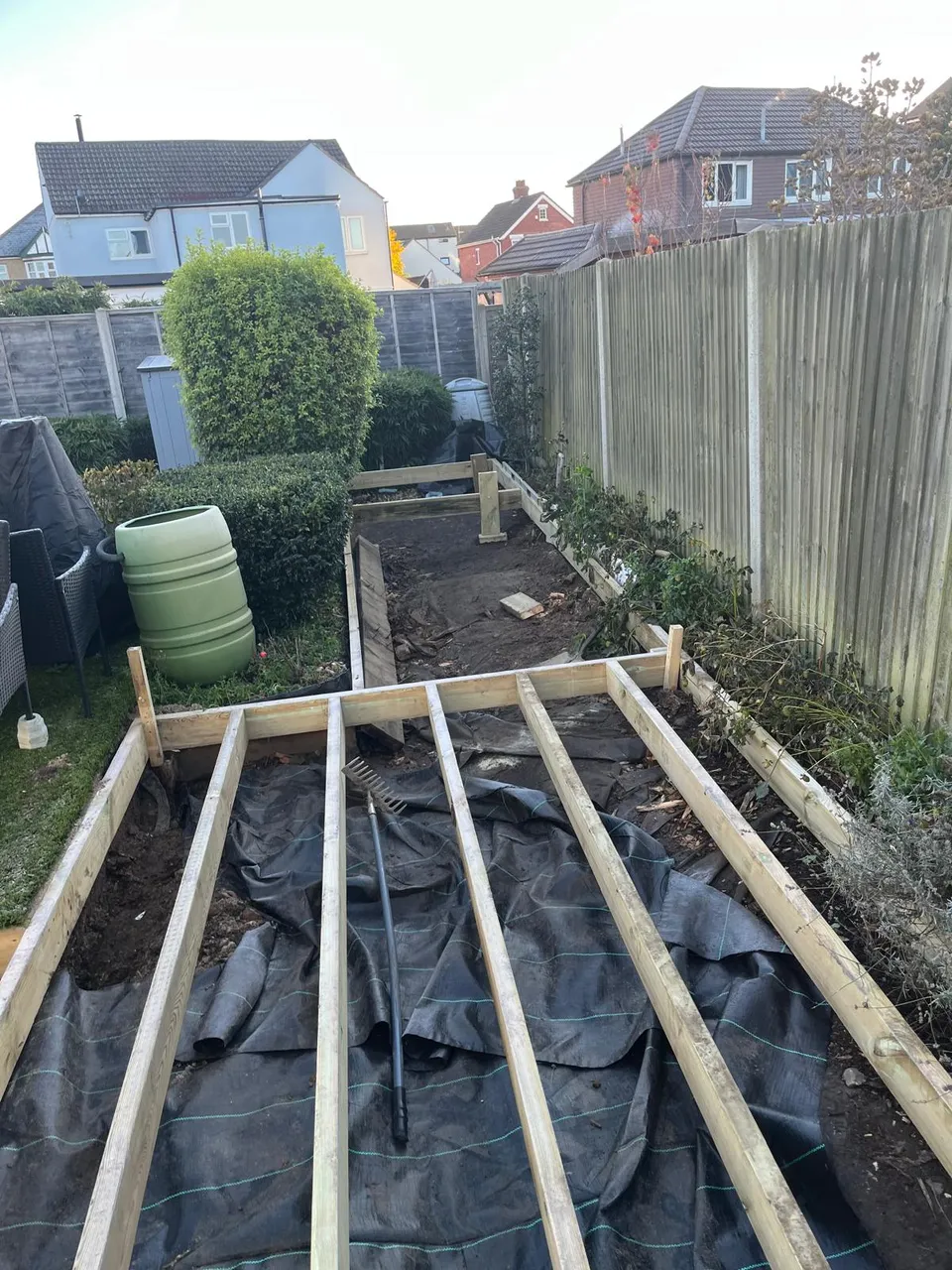 New decking frame of timber joists laid over weed membrane